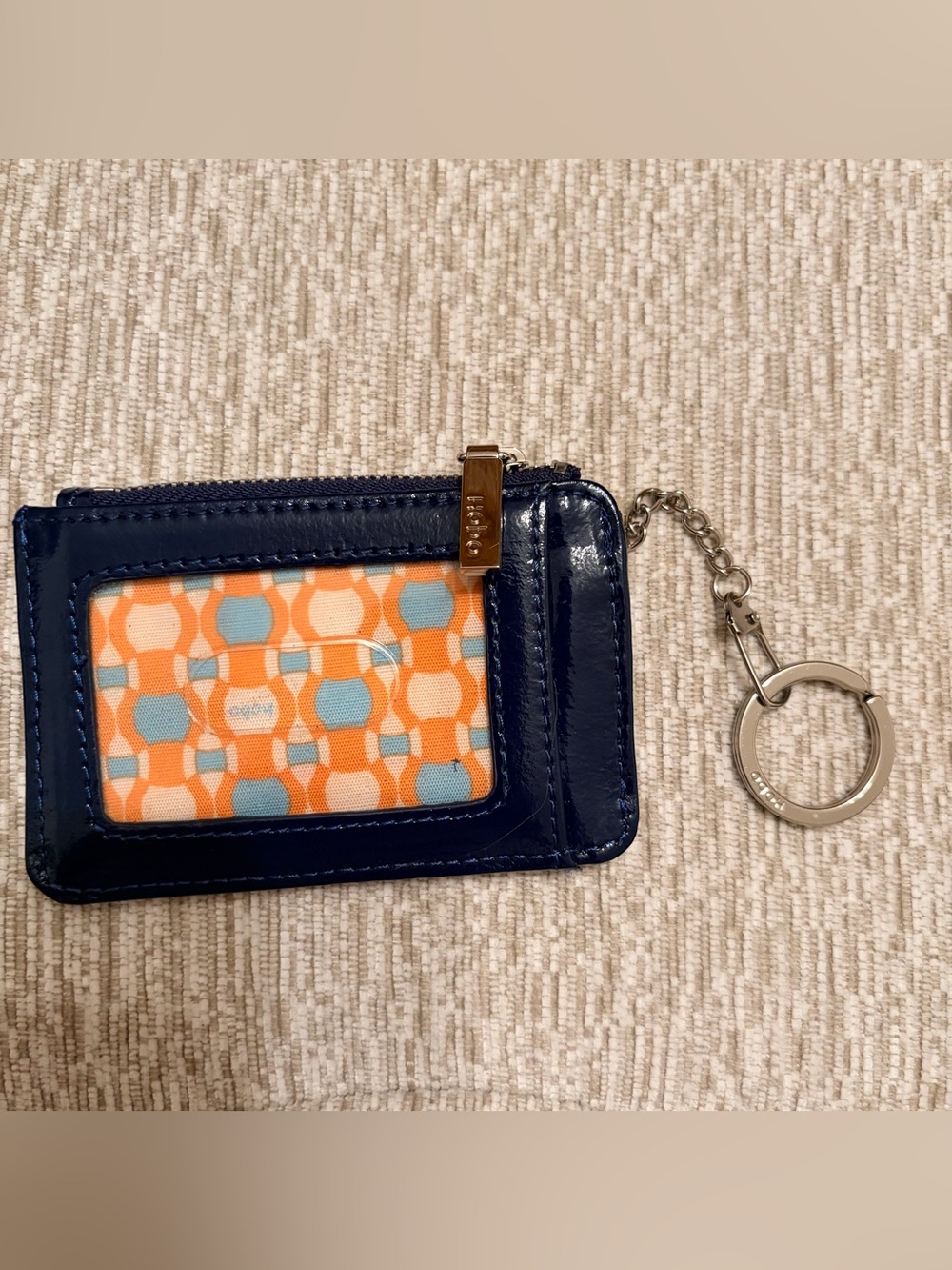 HOBO Navy Patent Leather Zip Card Holder with Orange & Light Blue Pattern